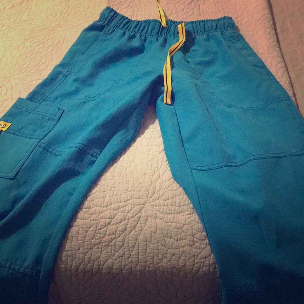2 blue scrub pants